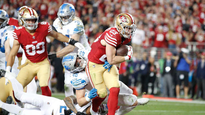 49ers running back Christian McCaffrey runs the ball in for a touchdown in the third quarter of the