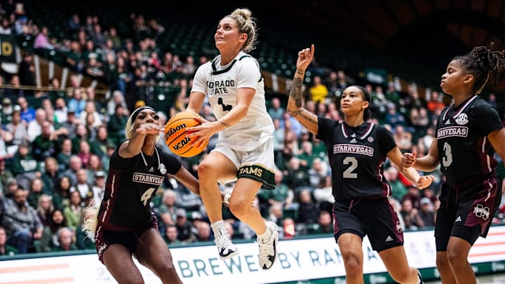 Colorado State University's McKenna Hofschild goes up for two points during a against Mississippi