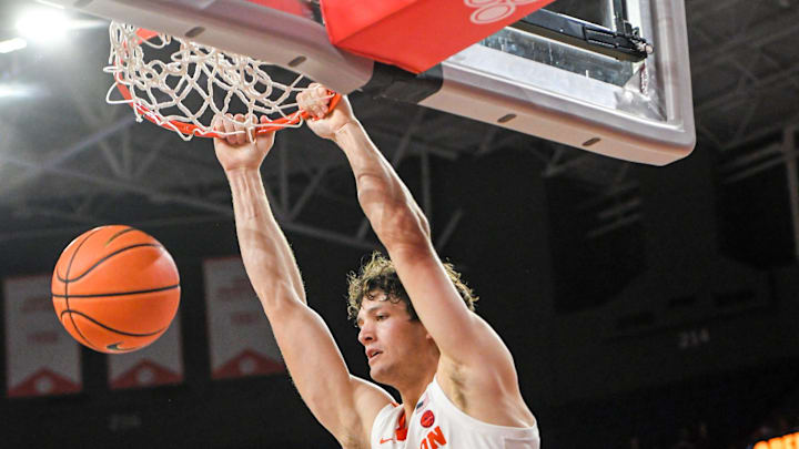 Clemson junior forward PJ Hall (24) dunks against Winthrop during the second half at Littlejohn