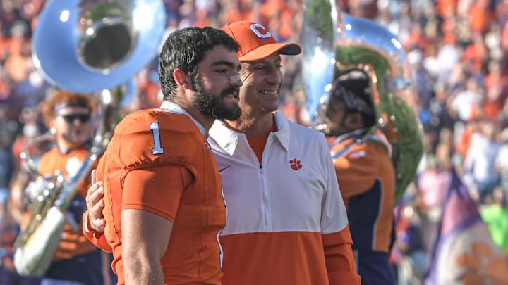 Nov 18, 2023; Clemson, South Carolina, USA; Clemson head coach Dabo Swinney poses with Will Shipley on Senior Day