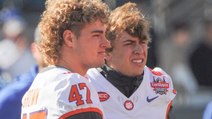 Clemson linebacker Sammy Brown and kicker Nolan Hauser (81) before the TaxSlayer Gator Bowl