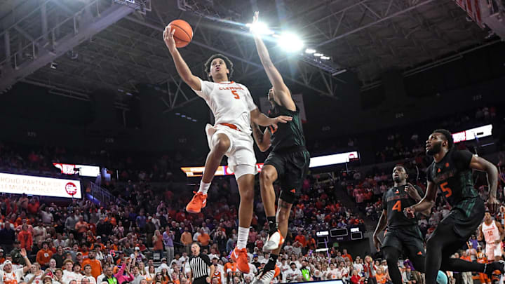 Feb 14, 2024; Clemson, South Carolina, USA;  Clemson graduate Jack Clark (5) scores near Miami