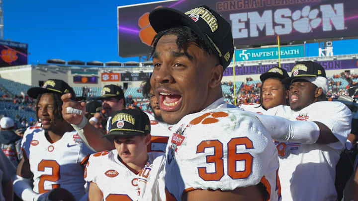 Dec 29, 2023; Jacksonville, FL, USA; Clemson Tigers safety Khalil Barnes (36) celebrates
