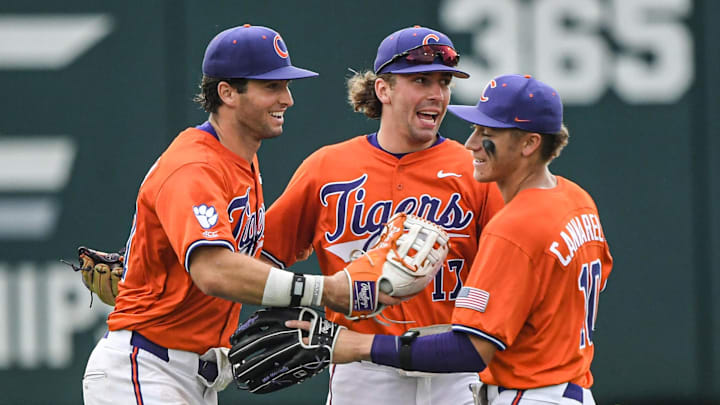 Clemson sophomore Tristan Bissetta (27), left, senior Alden Mathes (17) and sophomore Cam Cannarella (10)