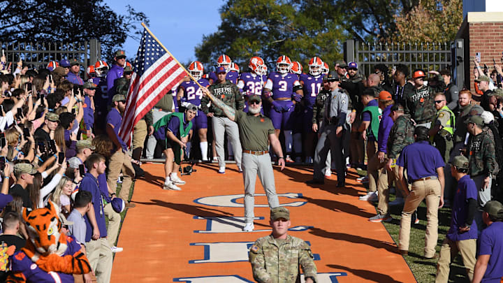 Nov 23, 2024; Clemson, South Carolina, USA; Clemson Tigers players get ready to run down the hill on Military Appreciation Day and Senior Day before a game against The Citadel Bulldogs at Memorial Stadium. Mandatory Credit: Ken Ruinard-Imagn Images