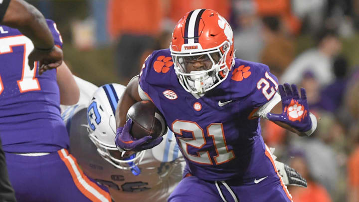 Nov 23, 2024; Clemson, South Carolina, USA; Clemson Tigers running back Jarvis Green (21) runs against The Citadel Bulldogs during the fourth quarter at Memorial Stadium. Mandatory Credit: Ken Ruinard-Imagn Images Nov 23, 2024; Clemson, South Carolina, USA; Clemson Tigers running back Jarvis Green (21) runs against The Citadel Bulldogs during the fourth quarter at Memorial Stadium. Mandatory Credit: Ken Ruinard-Imagn Images