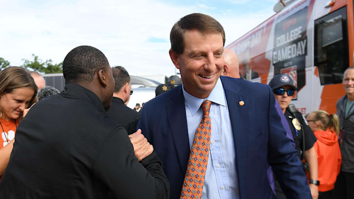 Oct 1, 2022; Clemson, South Carolina, USA; Clemson head coach Dabo Swinney greets former Clemson player Jacoby Ford during ESPN College GameDay before playing the NC State Wolfpack at Memorial Stadium. Mandatory Credit: Ken Ruinard-Imagn Images Oct 1, 2022; Clemson, South Carolina, USA; Clemson head coach Dabo Swinney greets former Clemson player Jacoby Ford during ESPN College GameDay before playing the NC State Wolfpack at Memorial Stadium. Mandatory Credit: Ken Ruinard-Imagn Images