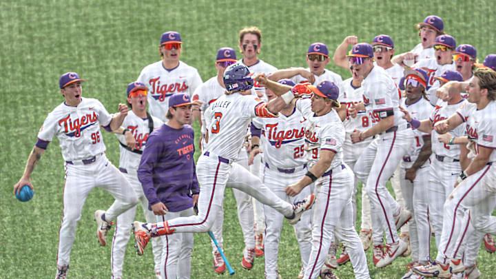 Clemson outfielder Ty Dalley (3) celebrates his home run with teammates playing South Carolina during the bottom of the fourth inning at Doug Kingsmore Stadium in Clemson, S.C. Sunday, March 1, 2026.