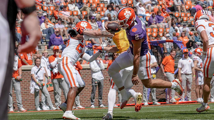 Clemson quarterback Tait Reynolds (2) scores during the first half at the annnual Clemson Orange and White spring game at Memorial Stadium in Clemson, South Carolina Saturday, March 28, 2026. Clemson quarterback Tait Reynolds (2) scores during the first half at the annnual Clemson Orange and White spring game at Memorial Stadium in Clemson, South Carolina Saturday, March 28, 2026.