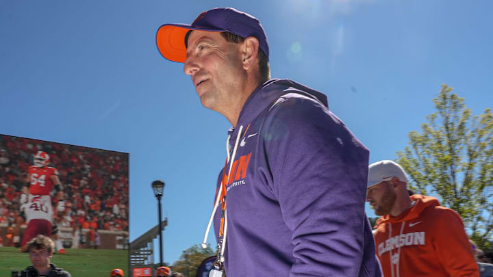 Clemson head coach Dabo Swinney waves to fans and greets them at Tiger Walk before the annnual Clemson Orange and White spring game at Memorial Stadium in Clemson, South Carolina Saturday, March 28, 2026.