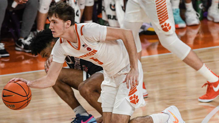 Nov 21, 2024; Clemson, SC, USA; Clemson forward Asa Thomas (5) brings the ball up court against Radford during the first half at Littlejohn Coliseum Thursday, November 21, 2024; Clemson, SC, USA.  Mandatory Credit: Ken Ruinard/USA TODAY Network via Imagn Images 