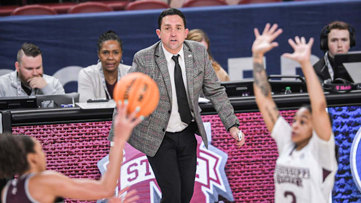Mississippi State Coach Sam Purcell watches Mississippi State guard JerKaila Jordan (2) defend Texas