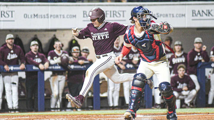 Mississippi State catcher Johnny Long (18) scores behind Ole Miss catcher Trenton Lyons (24) in the