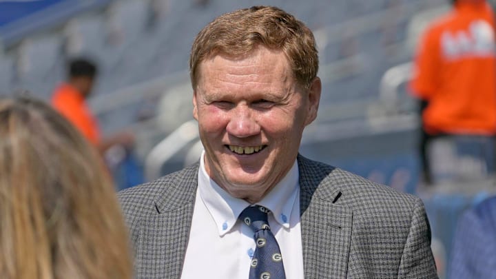 Green Bay Packers president Mark Murphy talks with people before the Green Bay Packers play the