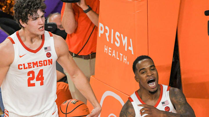 Clemson sophomore guard Al-Amir Dawes reacts after scoring and begin fouled, near teammate  PJ Hall