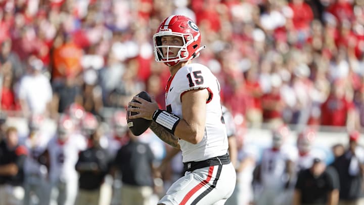 Oct 28, 2023; Jacksonville, Florida, USA; Georgia Bulldogs quarterback Carson Beck (15) looks to