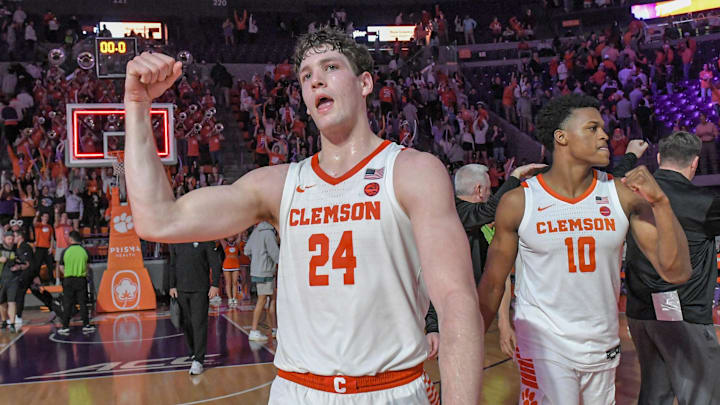 Feb 27, 2024; Clemson, South Carolina, USA; Clemson junior forward PJ Hall (24) and RJ Godfrey (10) celebrate a win. 
