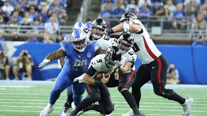 Detroit Lions defensive tackle Benito Jones (94) sacks Atlanta Falcons quarterback Desmond Ridder