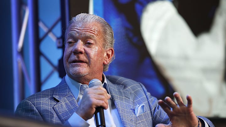 Colts owner Jim Irsay talks to Jeff Saturday during the Colts Town Hall Meeting with their fans and