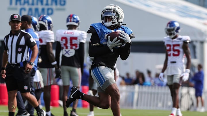 Detroit Lions running back Jahmyr Gibbs makes a catch during joint practice with New York Giants at Detroit Lions headquarters and training facility in Allen Park on Tuesday, August 8, 2023.