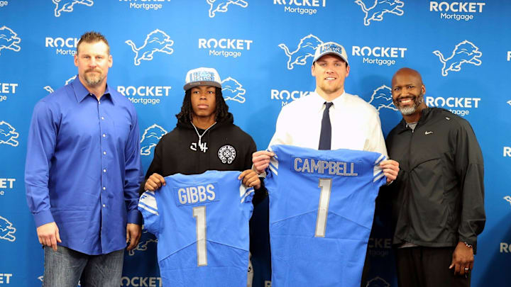 Detroit Lions coach Dan Campbell, Jahmyr Gibbs from Alabama, Jack Campbell from Iowa, and general manager Brad Holmes pose during the players' introductory news conference at team headquarters in Allen Park on Friday, April 28, 2023.