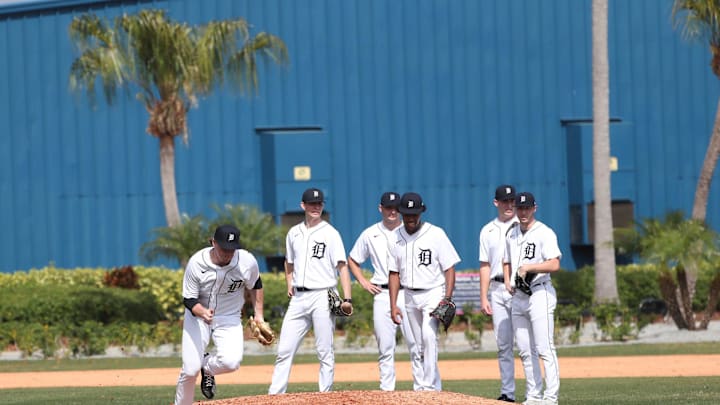Detroit Tigers pitching prospects work on fielding during spring training minor league minicamp on Friday.