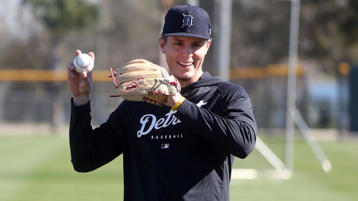 Detroit Tigers utility player Nick Maton plays catch during spring training.