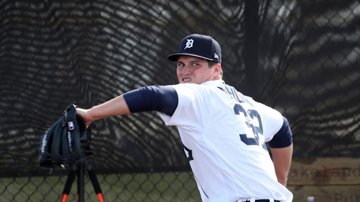 Detroit Tigers pitching prospect Ty Madden warms up before throwing live batting practice during