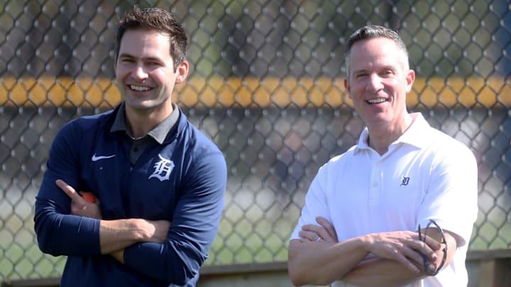 Tigers president of baseball operations Scott Harris and owner Christopher Ilitch and watch the
