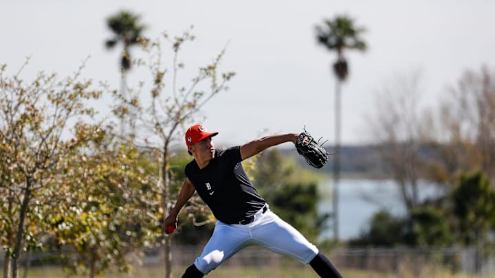 Detroit Tigers pitcher Wilmer Flores warms up during spring training at Tigertown in Lakeland, Fla.