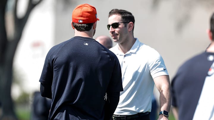 Detroit Tigers vice president and assistant general manager Sam Menzin talks to pitcher Casey Mize during spring training at Tigertown in Lakeland, Fla. on Wednesday, Feb. 14, 2024.