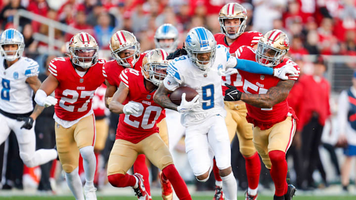 Detroit Lions wide receiver Jameson Williams (9) runs the ball past San Francisco 49ers linebacker Dre Greenlaw (57) in the first quarter of the NFC Championship game at Levi's Stadium in Santa Clara, Calif. on Sunday, January 28, 2024.