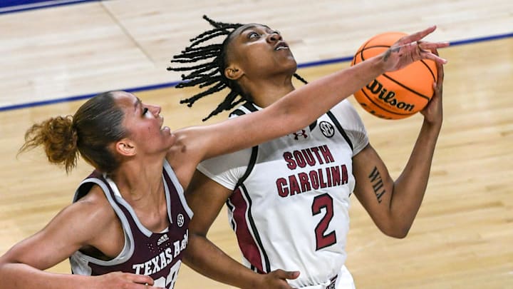 South Carolina forward Ashlyn Watkins (2) gets a pass near Texas A & M forward Lauren Ware (32) during the first quarter of the SEC Women's Basketball Tournament game at the Bon Secours Wellness Arena in Greenville, S.C. Friday, March 8, 2024.