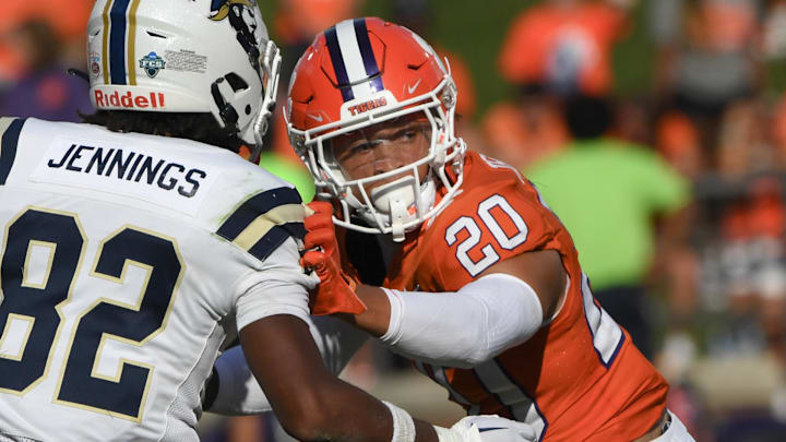 Sep 9, 2023; Clemson, South Carolina, USA; Clemson corner back Avieon Terrell (20) defends Charleston Southern receiver Noah Jennings (82) during the fourth quarter at Memorial Stadium. Mandatory Credit: Ken Ruinard-Imagn Images