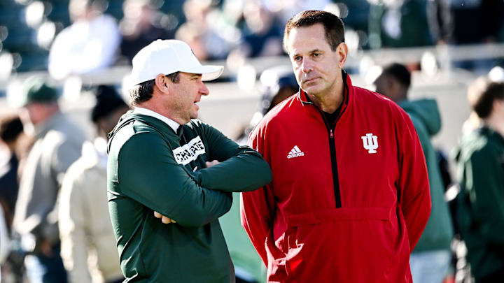 Michigan State's head coach Jonathan Smith, left, talks with Indiana's head coach Curt Cignetti before the game on Saturday, Nov. 2, 2024, at Spartan Stadium in East Lansing.