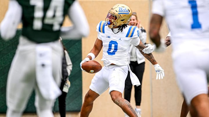 UCLA's Jalen Berger runs for a touchdown against Michigan State during the first quarter on Saturday, Oct. 11, 2025, at Spartan Stadium in East Lansing.