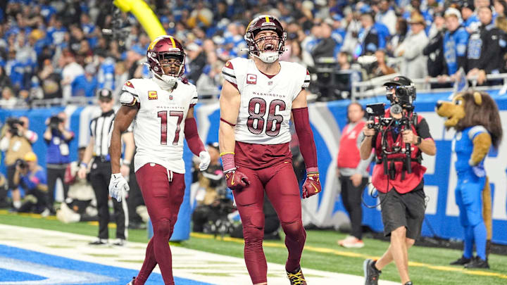 Washington Commanders tight end Zach Ertz (86) celebrates a touchdown against Detroit Lions during the first half of the NFC divisional round at Ford Field in Detroit on Saturday, Jan. 18, 2025.
