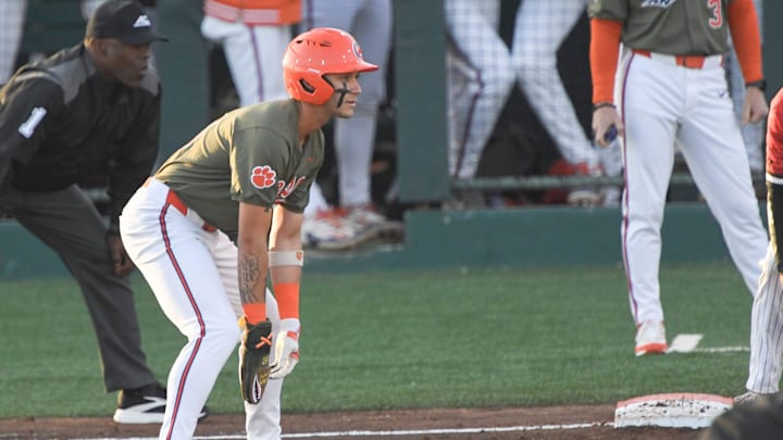 Clemson outfieler Cam Cannarella (10) takes a lead on first base during the bottom of the first inning at Doug Kingsmore Stadum in Clemson, S.C. Wednesday, April 9, 2025.