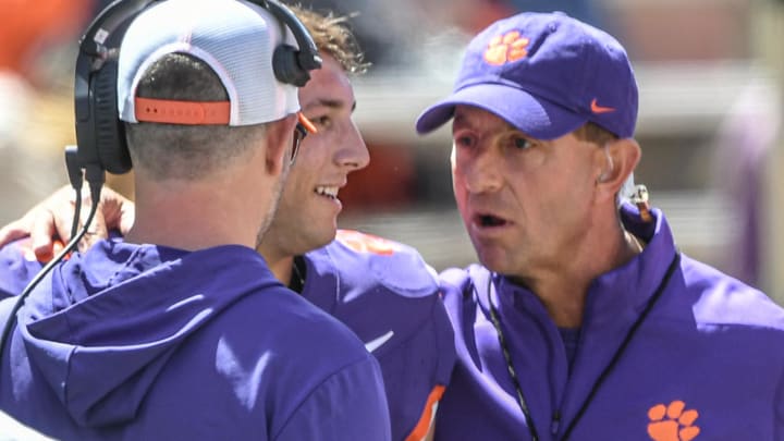 Clemson quarterback Cade Klubnik (2) listens to Clemson head coach Dabo Swinney and Clemson offensive coordinator Garrett Riley during the first quarter of the Spring football game in Clemson, S.C. Saturday, April 6, 2024. Clemson quarterback Cade Klubnik (2) listens to Clemson head coach Dabo Swinney and Clemson offensive coordinator Garrett Riley during the first quarter of the Spring football game in Clemson, S.C. Saturday, April 6, 2024.