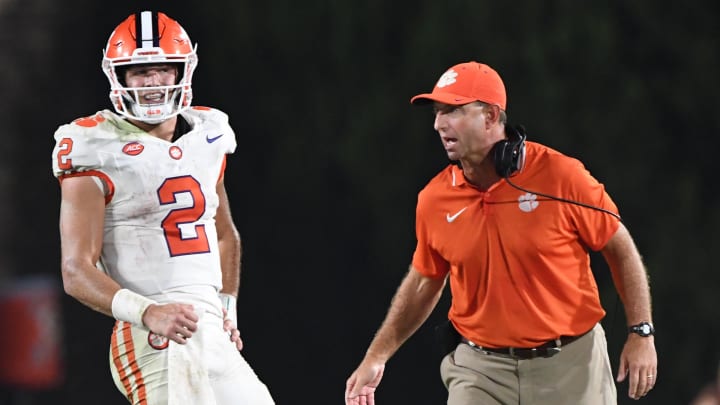 Sep 4, 2023; Durham, North Carolina, USA; Clemson Tigers quarterback Cade Klubnik (2) talks with head coach Dabo Swinney during the fourth quarter of the season opening game at Wallace Wade Stadium in Durham, N.C. Sep 4, 2023; Durham, North Carolina, USA; Clemson Tigers quarterback Cade Klubnik (2) talks with head coach Dabo Swinney during the fourth quarter of the season opening game at Wallace Wade Stadium in Durham, N.C.
