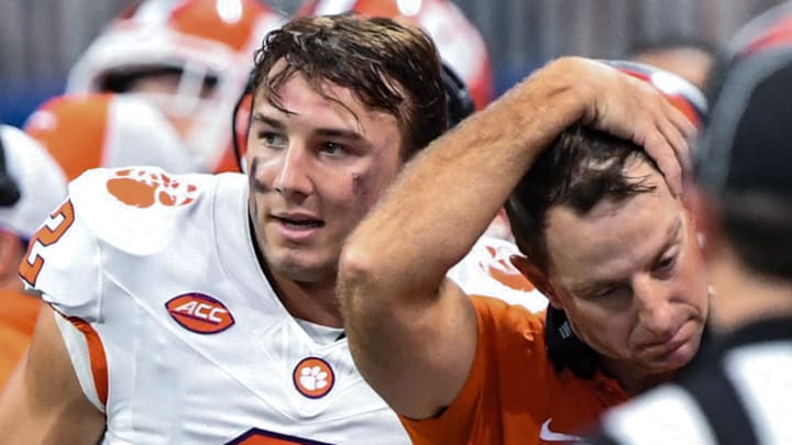 Aug 31, 2024; Atlanta, Georgia, USA; Clemson Tigers quarterback Cade Klubnik (2) and head coach Dabo Swinney react after Klubnik threw an interception against Georgia Bulldogs during the fourth quarter of the 2024 Aflac Kickoff Game at Mercedes-Benz Stadium. 
