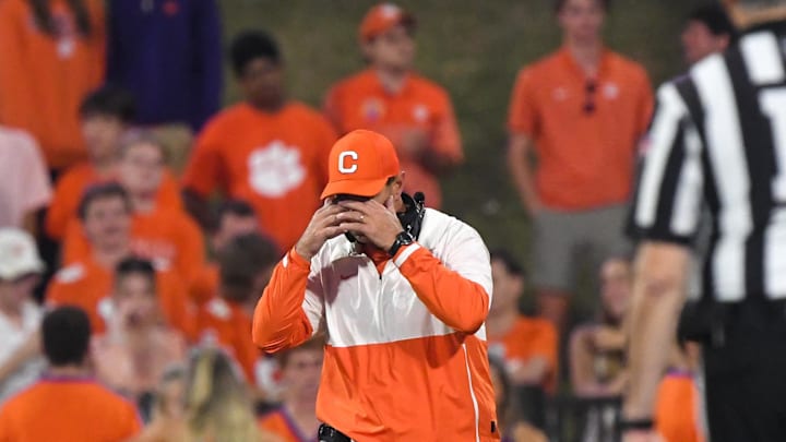 Nov 2, 2024; Clemson, South Carolina, USA; Clemson Tigers head coach Dabo Swinney reacts after people in the stands threw water bottles on the field after a call in favor of the Louisville Cardinals Cardinals during the fourth quarter at Memorial Stadium. Mandatory Credit: Ken Ruinard-Imagn Images