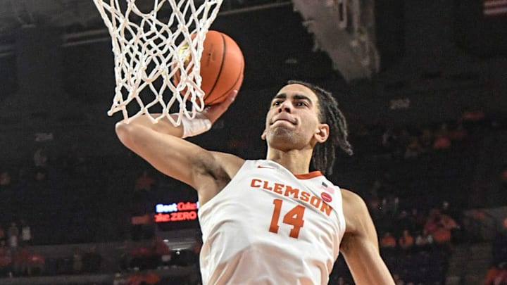 Clemson center Christian Reeves (14) warms up before tipoff at Littlejohn Coliseum in Clemson, S.C Monday, November 4, 2024. Clemson center Christian Reeves (14) warms up before tipoff at Littlejohn Coliseum in Clemson, S.C Monday, November 4, 2024.