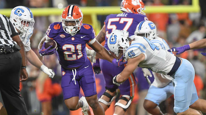 Nov 23, 2024; Clemson, South Carolina, USA; Clemson Tigers running back Jarvis Green (21) runs against The Citadel Bulldogs during the fourth quarter at Memorial Stadium.