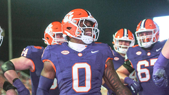 Nov 23, 2024; Clemson, South Carolina, USA; Clemson Tigers linebacker Barrett Carter (0) celebrates after scoring a touchdown against The Citadel Bulldogs during the fourth quarter at Memorial Stadium. Mandatory Credit: Ken Ruinard-Imagn Images