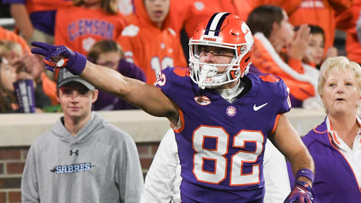 Nov 23, 2024; Clemson, South Carolina, USA; Clemson Tigers wide receiver Jackson Crosby (82) gets a first down after a catch against The Citadel Bulldogs during the third quarter at Memorial Stadium. Mandatory Credit: Ken Ruinard-Imagn Images