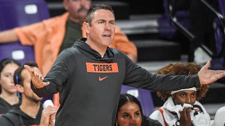 Nov 4, 2024; Clemson, SC, USA; Clemson Coach Shawn Poppie communicates in the game with Jackson State University during the fourth quarter at Littlejohn Coliseum in Clemson, S.C. Monday, Nov 4, 2024. Nov 4, 2024; Clemson, SC, USA; Clemson Coach Shawn Poppie communicates in the game with Jackson State University during the fourth quarter at Littlejohn Coliseum in Clemson, S.C. Monday, Nov 4, 2024.
