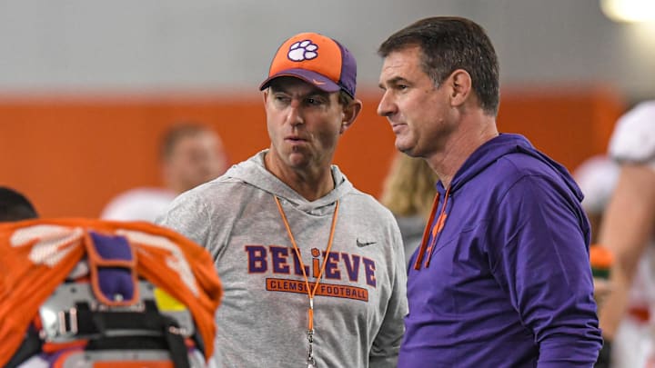 Clemson offensive analyst John Grass (right) is becoming the head coach of the Samford Bulldogs. Clemson offensive analyst John Grass (right) is becoming the head coach of the Samford Bulldogs.