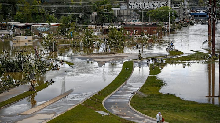 Flooding recedes in the River Arts District in downtown Asheville, N.C. Sep 29, 2024; , USA; during the aftermath of flooding caused by Hurricane Helene. Helene's swath of destruction brought historic rainfall, flooding, power outages and 140-mile-an-hour winds across the Southeast. North Carolina that bore the brunt of damage, with vast swaths of cities like Asheville underwater, residents trapped in their homes with no lights or food and few functioning roads for rescue workers to help them.. Flooding recedes in the River Arts District in downtown Asheville, N.C. Sep 29, 2024; , USA; during the aftermath of flooding caused by Hurricane Helene. Helene's swath of destruction brought historic rainfall, flooding, power outages and 140-mile-an-hour winds across the Southeast. North Carolina that bore the brunt of damage, with vast swaths of cities like Asheville underwater, residents trapped in their homes with no lights or food and few functioning roads for rescue workers to help them..