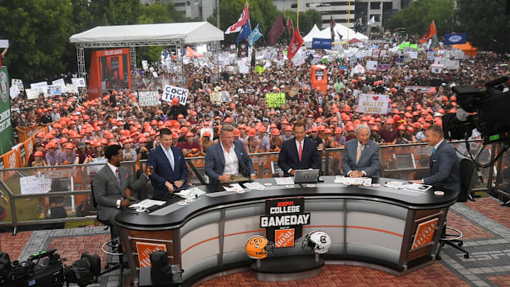 Desmond Howard, left, Rece Davis, Pat McAfee, Nick Saban, Lee Corso, and Kirk Herbstreit live broadcast during ESPN Gameday near Williams-Brice Stadium in Columbia, S.C